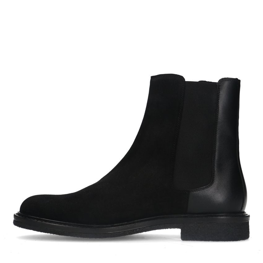 Zwarte suède chelsea boots met leren details