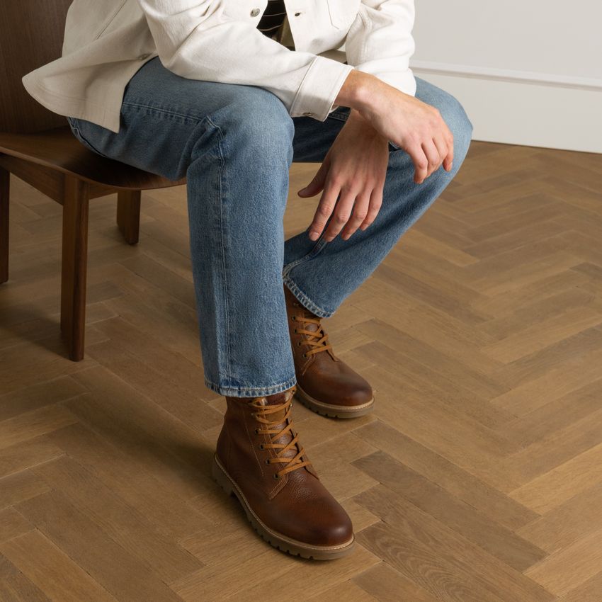 Cognacfarbene Lederboots mit Kunstfell