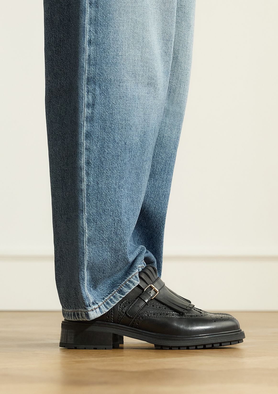 Schwarze Leder-Loafer mit Schnalle