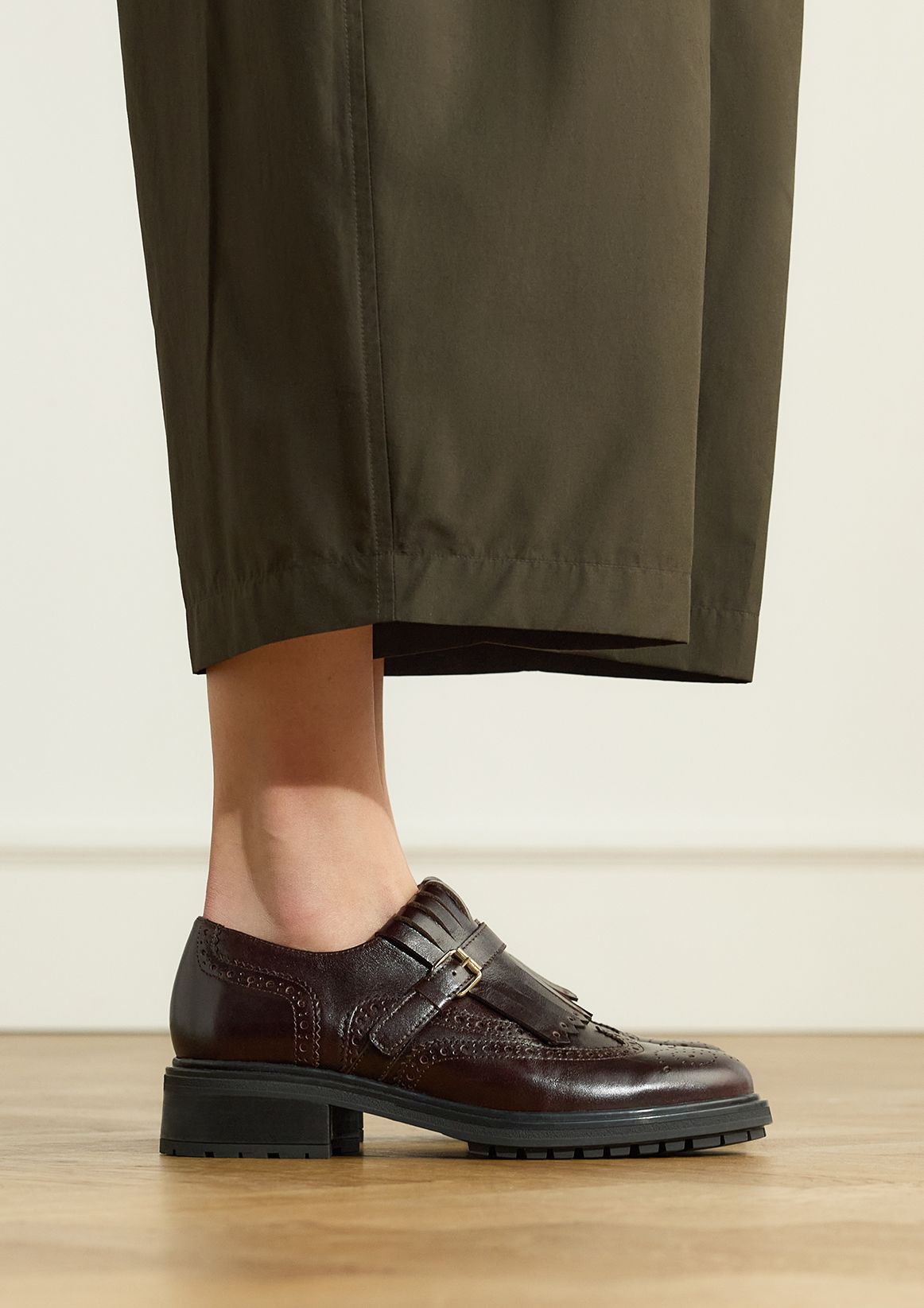Schwarze Leder-Loafer mit Schnalle