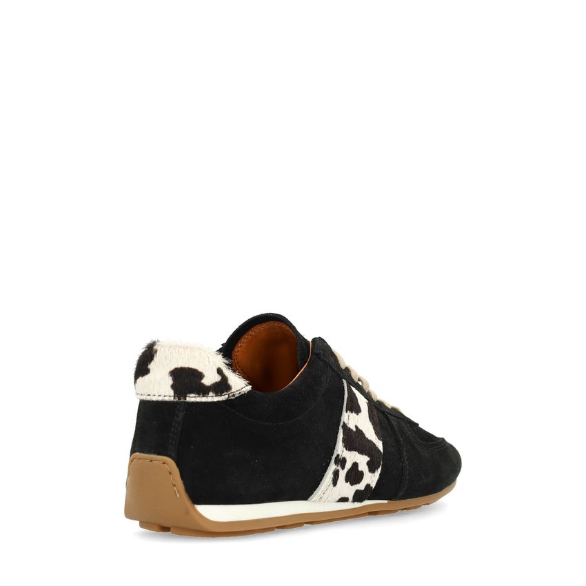 Zwarte suède sneakers met cow print detail