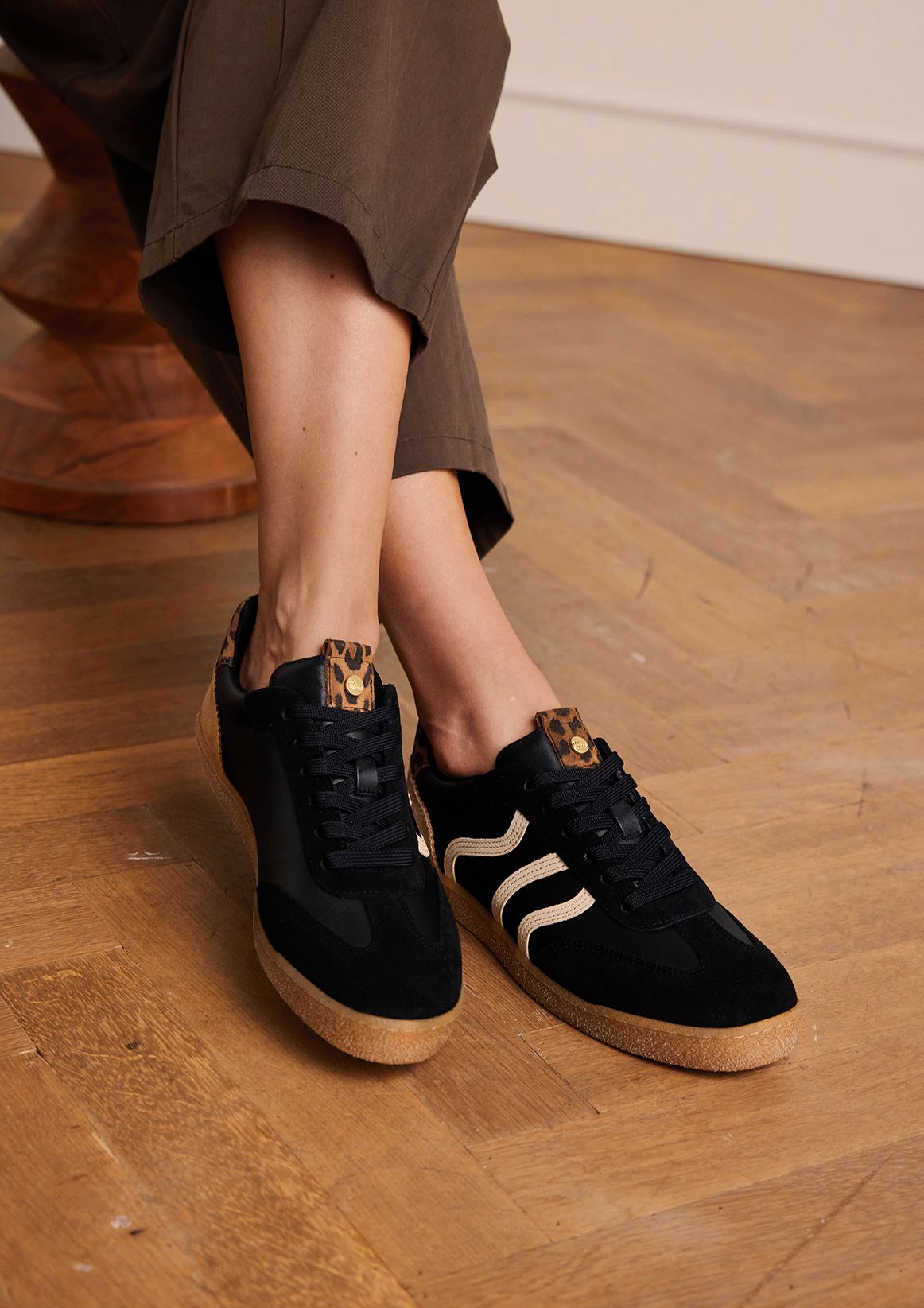 Zwarte leren sneakers met leopard details