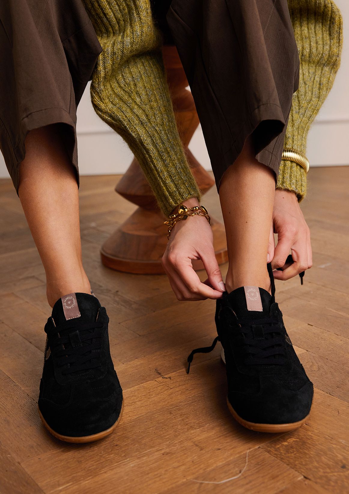Zwarte suède sneakers met leopard details