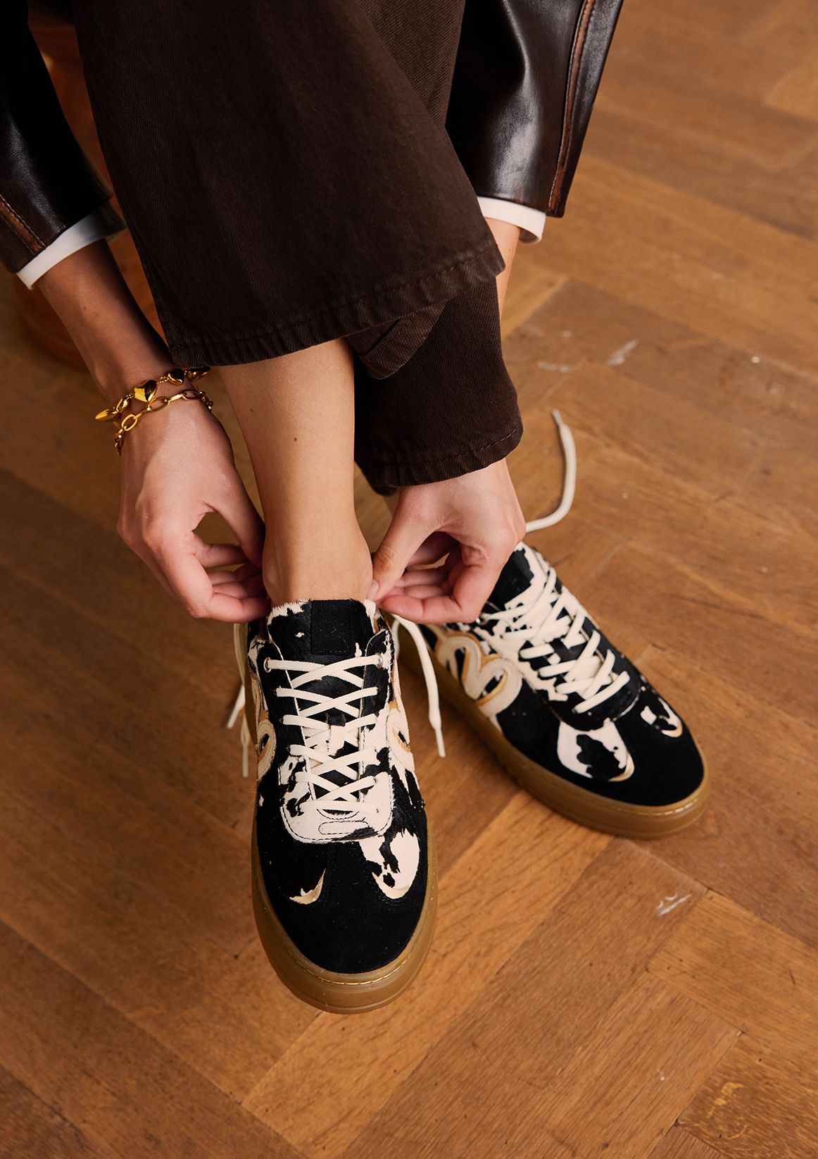 Zwarte cow print sneakers met pony hair