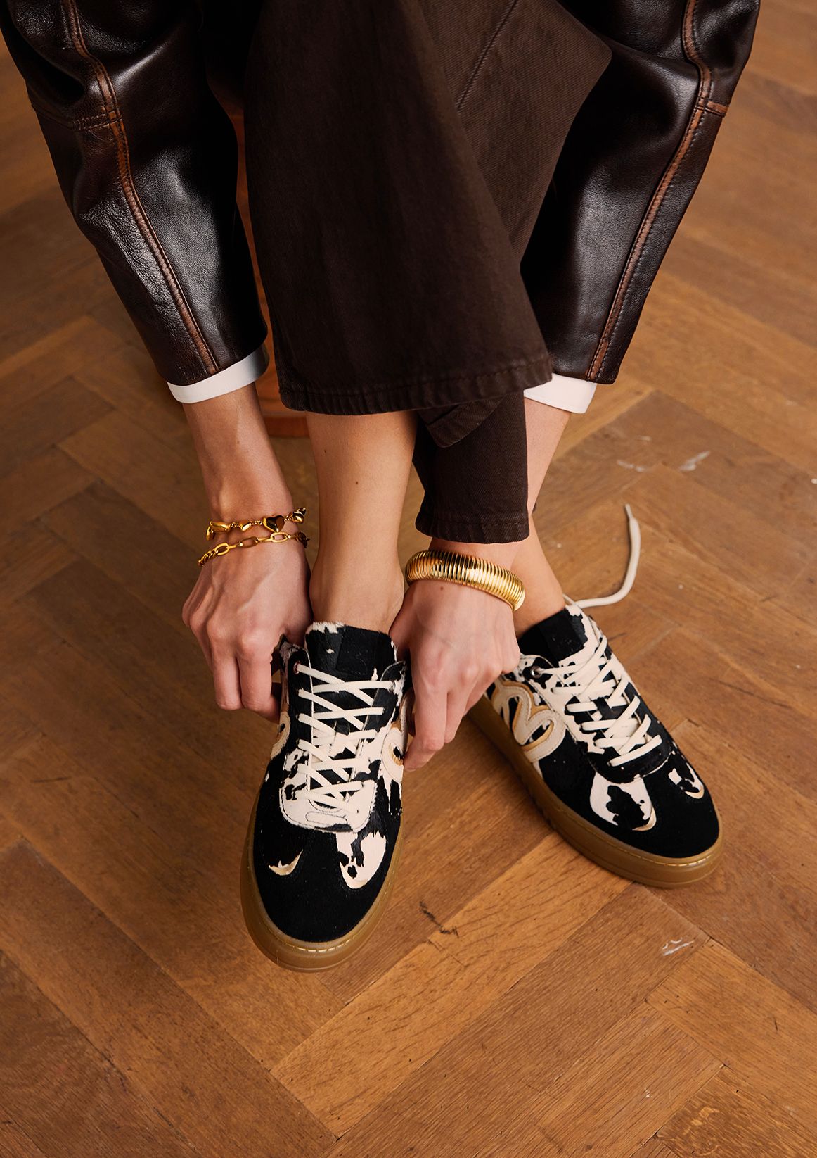 Zwarte cow print sneakers met pony hair