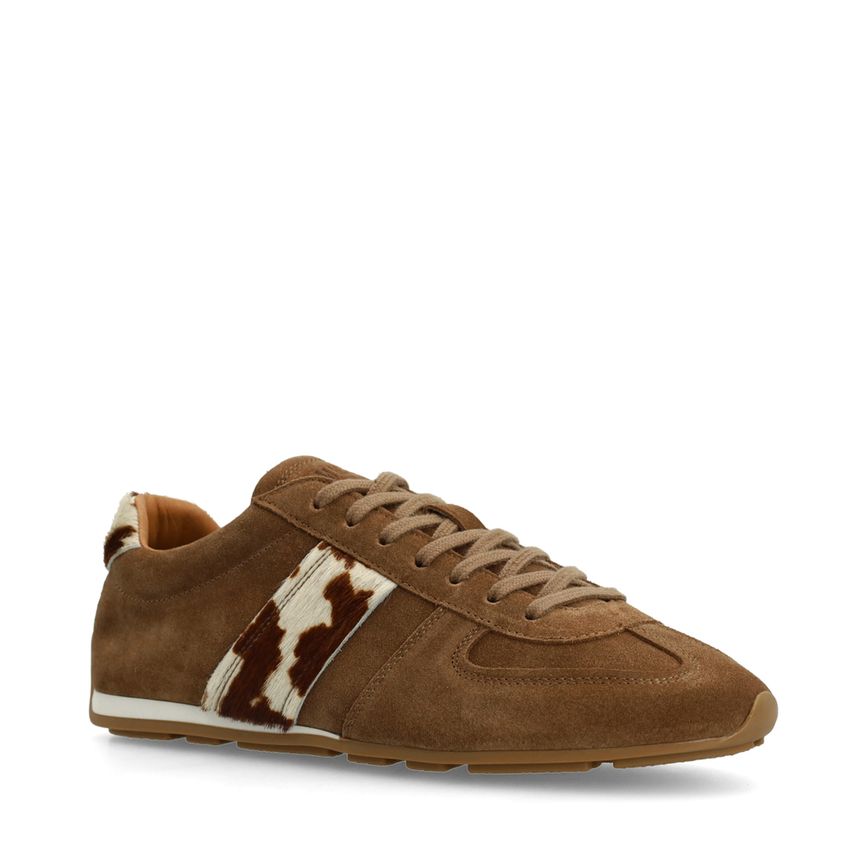 Bruine suède sneakers met cow print vacht