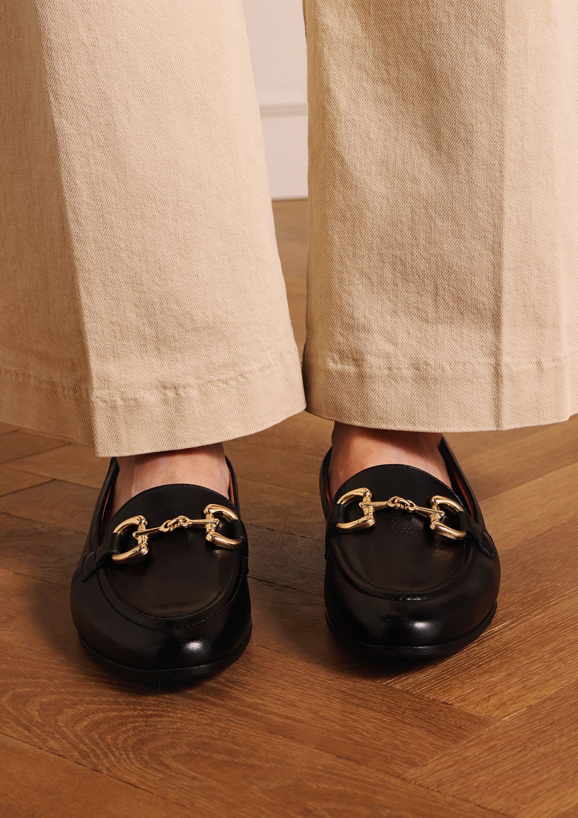 Zwarte leren loafers met gouden chain