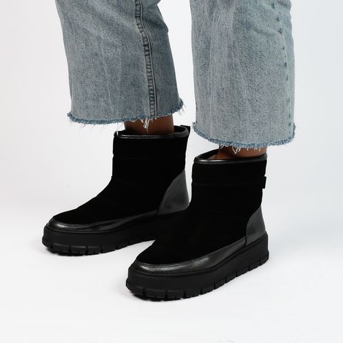 Zwarte snowboots van leer en suède