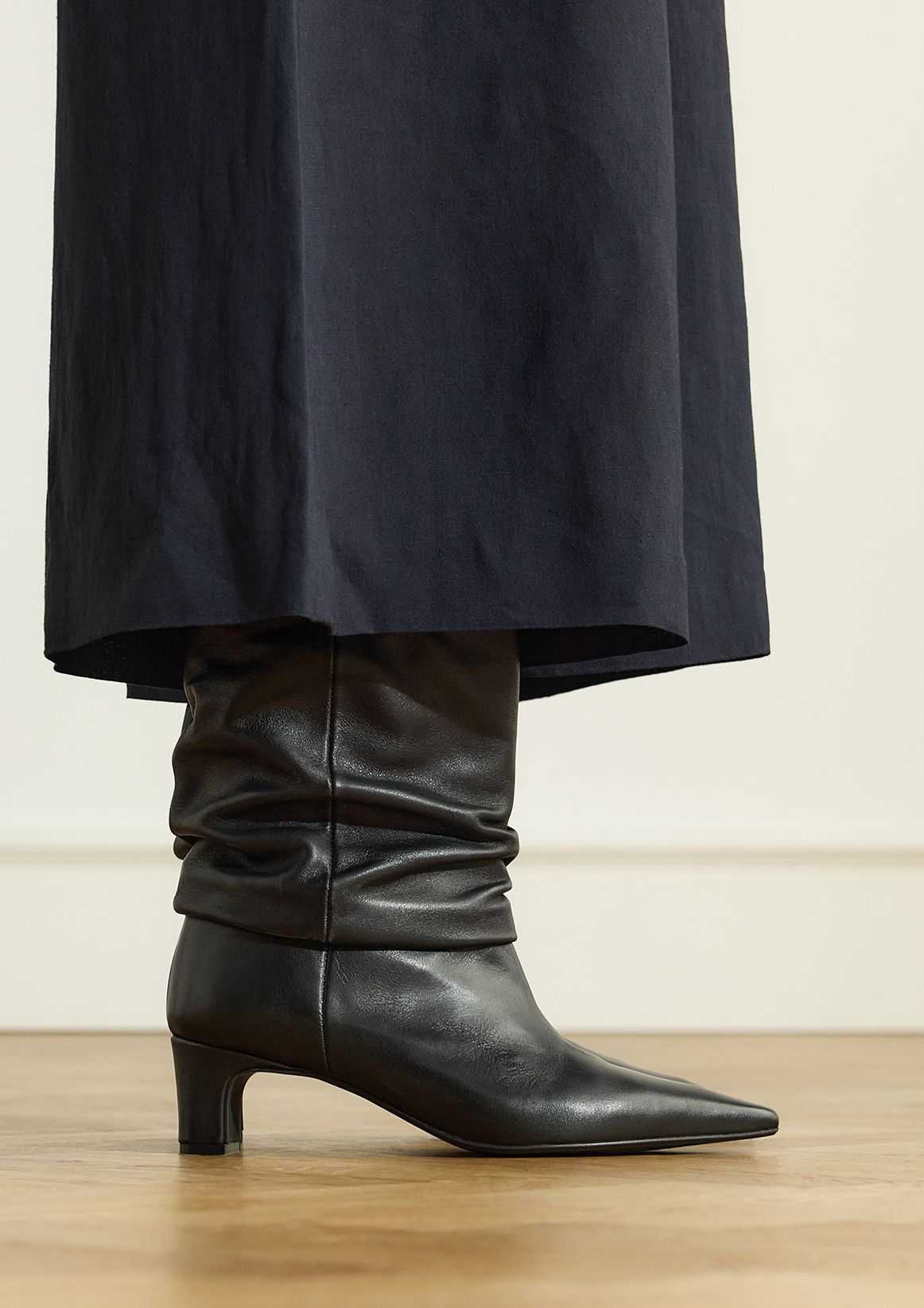 Zwarte leren slouchy enkellaarsjes met hak