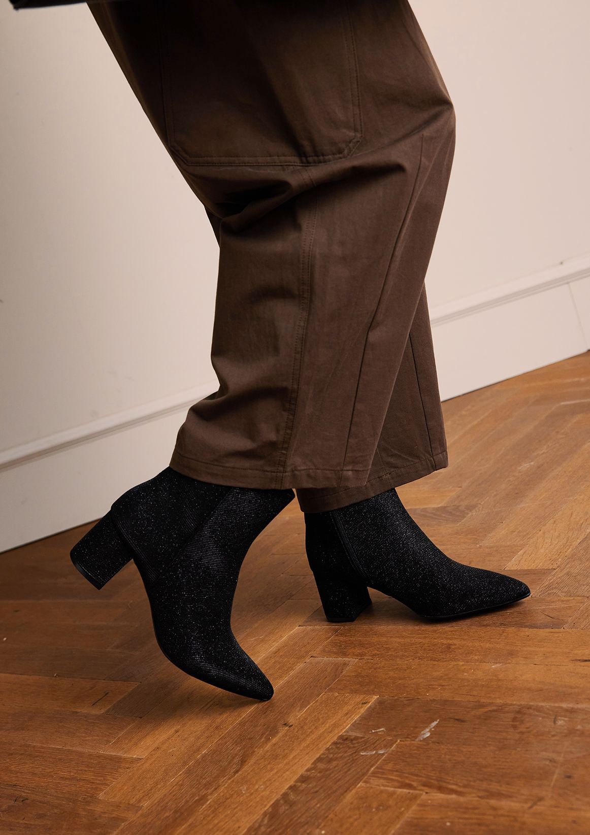 Schwarze Glitzer-Stiefeletten mit Absatz