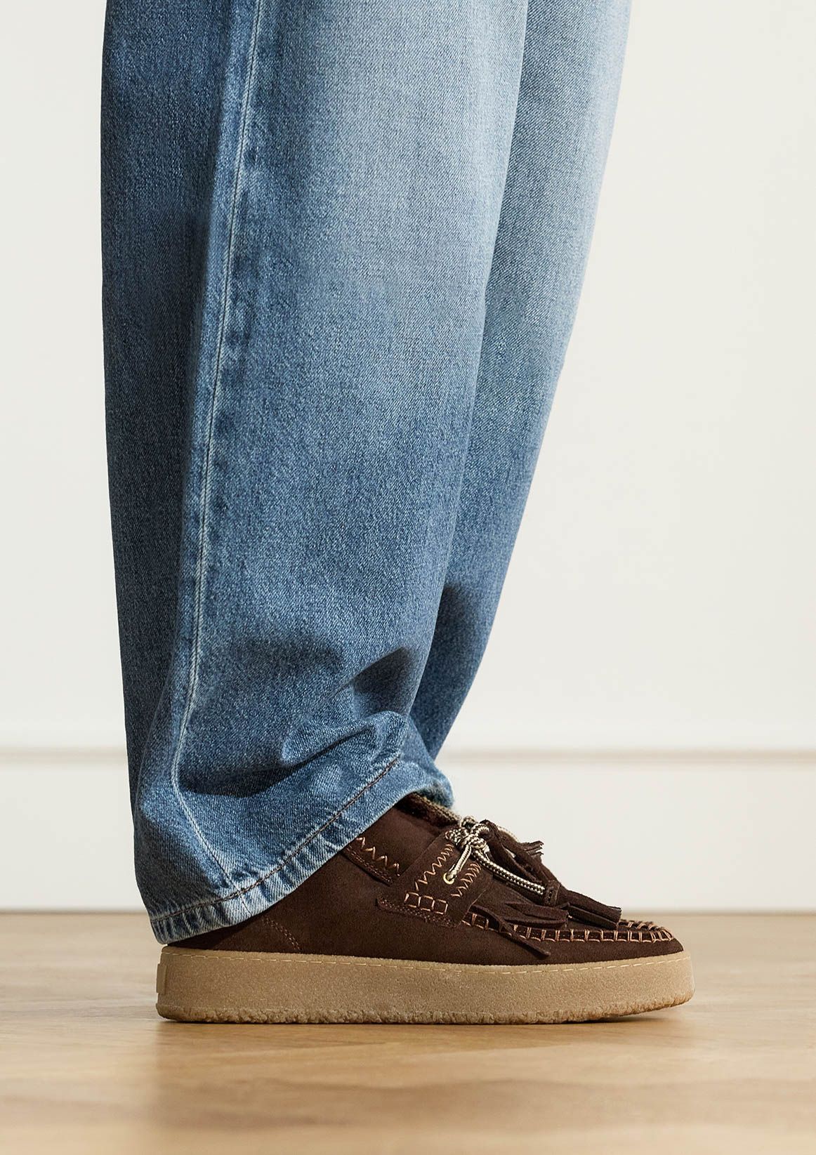 Dunkelbraune Velourslederboots mit Fransen