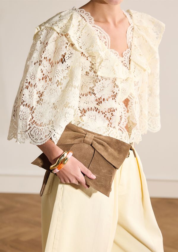 Taupe suède clutch met strik