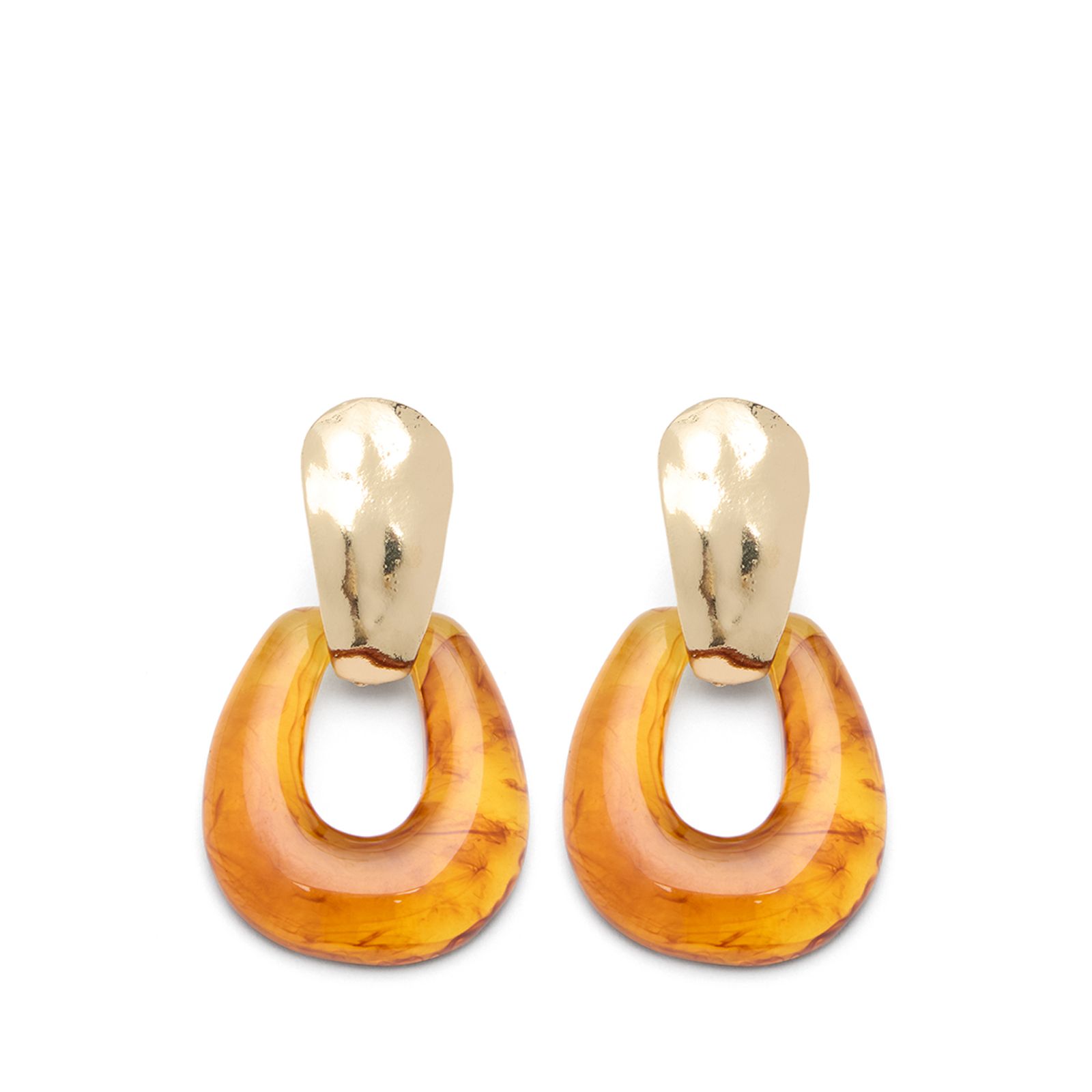 Goudkleurige statement oorbellen met bruine statement pieces