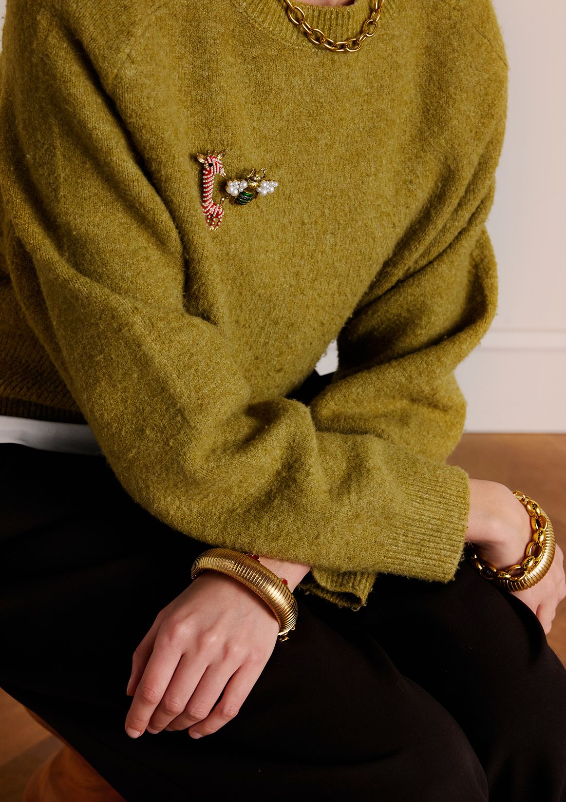 Goudkleurige giraffe broche