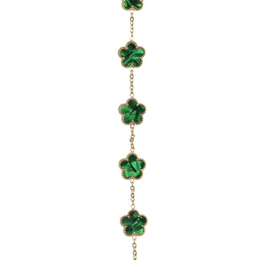Goudkleurige armband met groene klavertjes