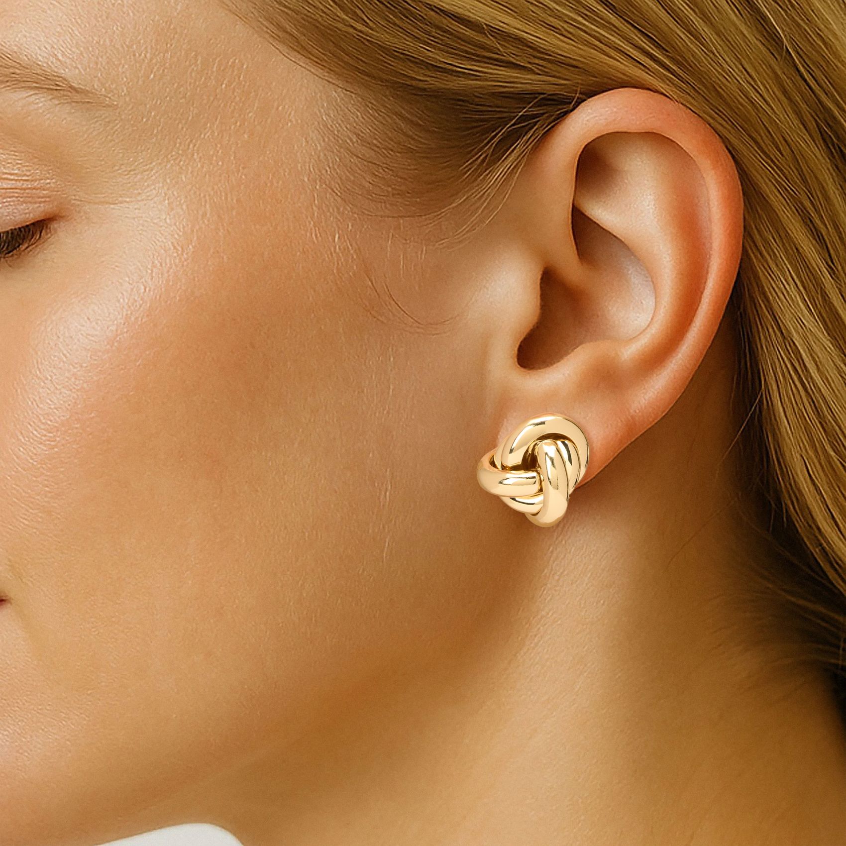 Goudkleurige knot oorbellen