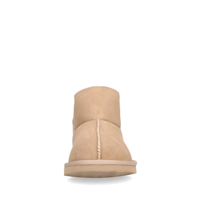 Hoge beige pantoffels met wollen voering